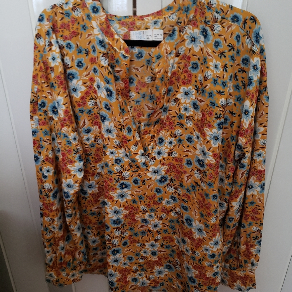 Brightly colored half button top